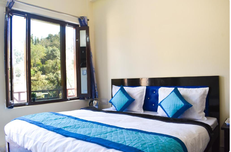 Best hotels in Chaukori for families - Deluxe Room interiors